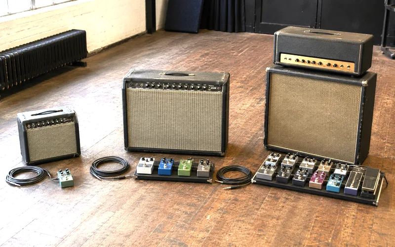 Guitar amplifier and pedal setups at three different budget levels