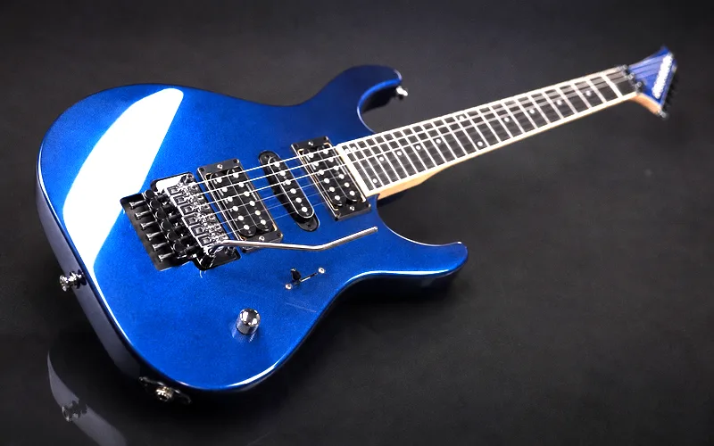 Modern Super Strat electric guitar with Floyd Rose tremolo, dual humbuckers, and 24-fret fingerboard designed for high-speed metal and shred playing