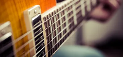 22 vs 24 Frets: Which Neck Is Right for You in 2026?