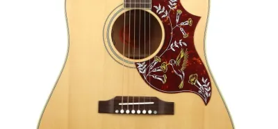 Gibson Montana Hummingbird acoustic guitar with its signature engraved pickguard