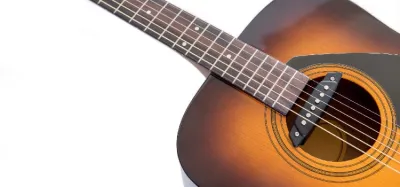 Acoustic guitar fitted with a soundhole pickup and output cable