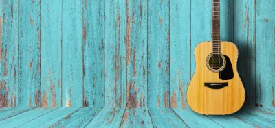 Acoustic dreadnought guitar set up for playing country music