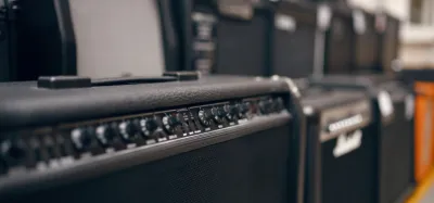 High-gain tube amp head paired with a 7 string electric guitar