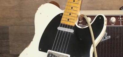 Tube amplifier paired with a Telecaster electric guitar