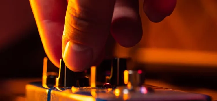 Analog chorus pedals lined up on a pedalboard with warm modulated tone