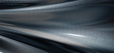 Carbon fiber travel guitar with a packable gig bag ready for travel