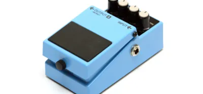 Chorus pedals lined up on a metal guitarist's pedalboard