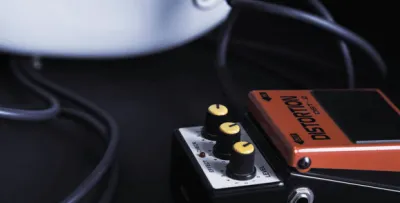Distortion pedals arranged on a pedalboard for classic rock guitar tone
