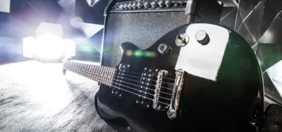 Electric guitar starter kit with guitar, amp, gig bag, and accessories
