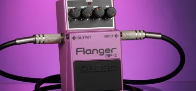 Guitar flanger pedals lined up on a pedalboard