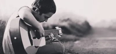 Beginner acoustic and electric guitars lined up for a buying guide