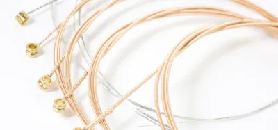 Heavy-gauge electric guitar strings coiled for metal playing