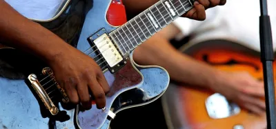 Hollowbody jazz guitar with f-holes and warm sunburst finish