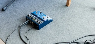 Guitar looper pedals lined up on a pedalboard