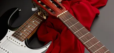 Cleaning a guitar fingerboard with a soft cloth and conditioning oil
