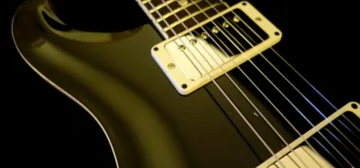 Swamp ash electric guitar body being cleaned with guitar polish and a soft cloth