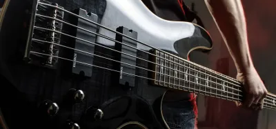 Bass guitar plugged into a combo guitar amp for practice