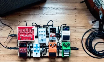 Beginner guitar effects pedals arranged on a pedalboard
