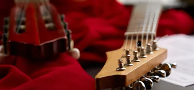 Neck-thru-body electric guitar showing the neck running through the center of the body