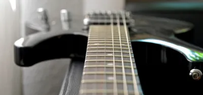 Used acoustic guitar laid out and ready to sell for cash