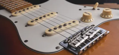 Vintage electric guitar representing the history of the first electric guitar made in the early 1930s