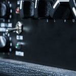 how to stop guitar amp from picking up radio